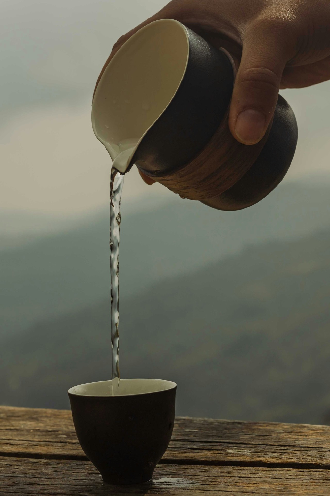 Tea being poured at Jhigu Casa