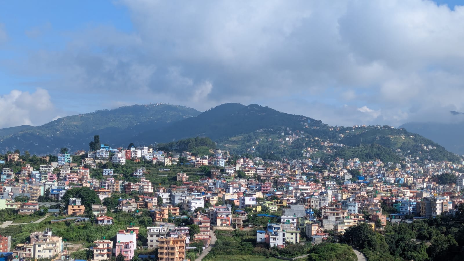 From our terrace, guests enjoy a breathtaking sweep across Indradaha and the Dahachowk ridgeline.